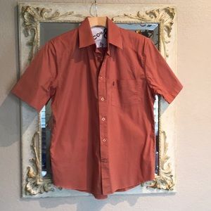 Volcom short sleeved button front shirt. Size S